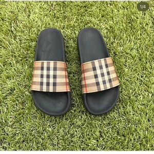 Kid Burberry pool slides … couple scratches, good condition overall size 2